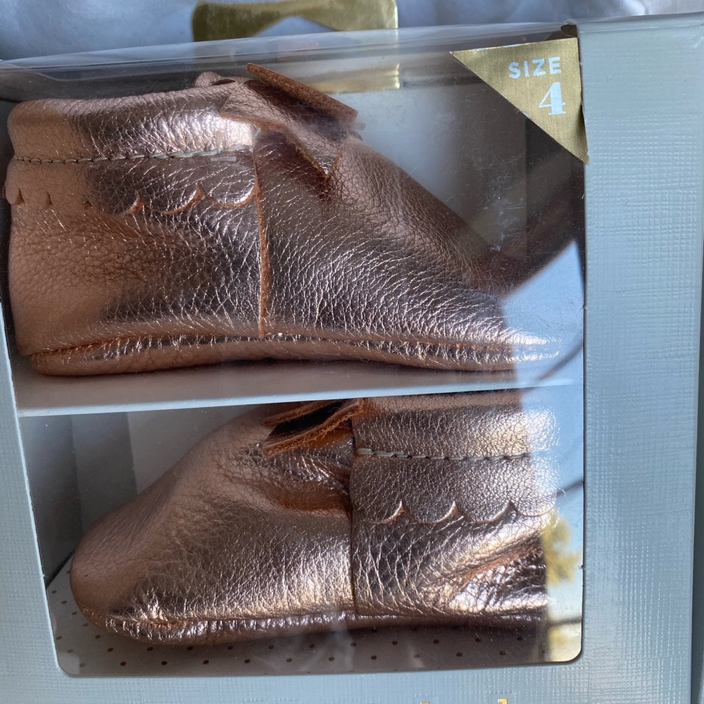Freshly picked rose gold bow moccasins size 4